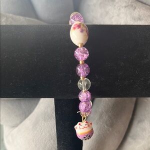 Purple Beaded Bracelet with Lucky Charm